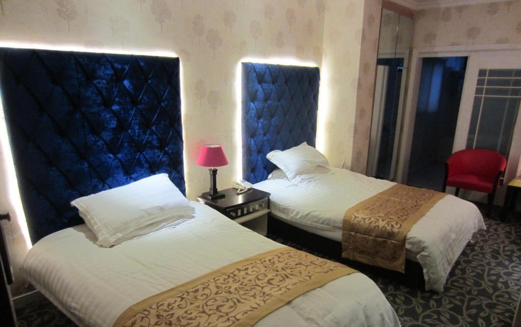 Jiujiu Holiday Hotel Shanghai Chambre photo