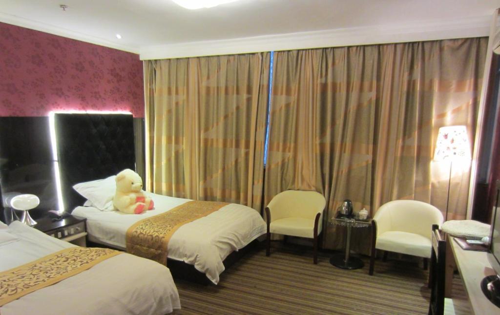 Jiujiu Holiday Hotel Shanghai Chambre photo